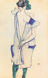 Rückenansicht eines Mädchens im blauen Rock